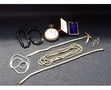 A 9CT GOLD STICK PIN WITH SILVER PIG TERMINAL with jewelled eye, another pin, a french 'Regulateur' pocket watch (A/F), and c