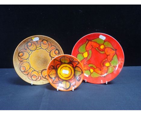 POOLE POTTERY: TWO 'DELPHIS' DISHES AND ONE 'AEGEAN' 13.5cm and 20cm