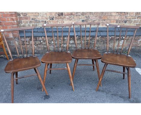 A SET OF FOUR ERCOL MID-CENTURY STICK-BACK DINING CHAIRS stained elm and beech, blue label, 1960 stamp (cushions avaliable fo