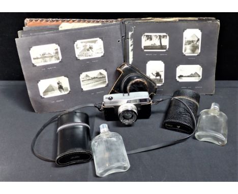 A VINTAGE CANON 'CANONET' CAMERA No.1562699, an album of Egypt and North Africa travel photographs 1944 - 1946, and two cased