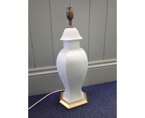 A BLANC-DE-CHINE VASE LAMP, WITH GILTWOOD BASE 49cm including fitting