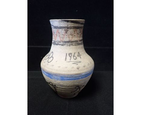 POOLE POTTERY: AN EARLY UNGLAZED CARTER'S VASE LATER DECORATED FOR THE 1964 OLYMPICS in a primitive style