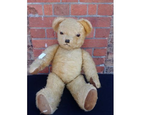 A VINTAGE TEDDY BEAR, CIRCA 1940s 68cm high