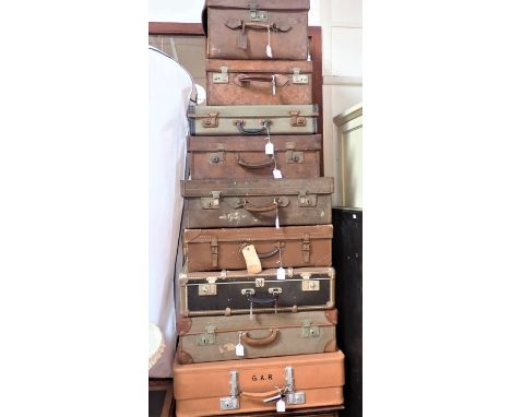 A COLLECTION OF VINTAGE LUGGAGE, SOME LEATHER with old labels (9)