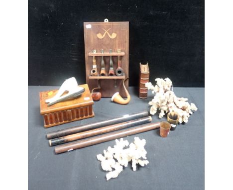 A MARQUETRY PUZZLE BOX, MONEY BOX, TOBACCO PIPES including novelty pair of ladies legs , pipe rack, natural coral pieces, hor