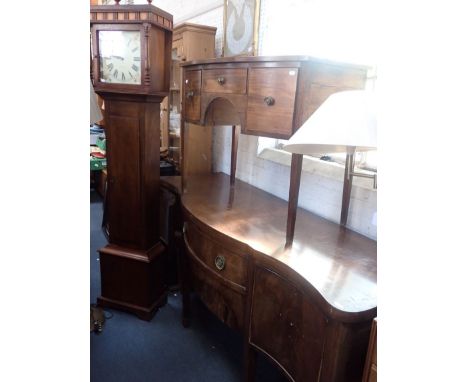 A GEORGE III MAHOGANY BOW-FRONT DRESSING TABLE 91cm wide, a mahogany sideboard, a reproduction longcase clock (battery moveme