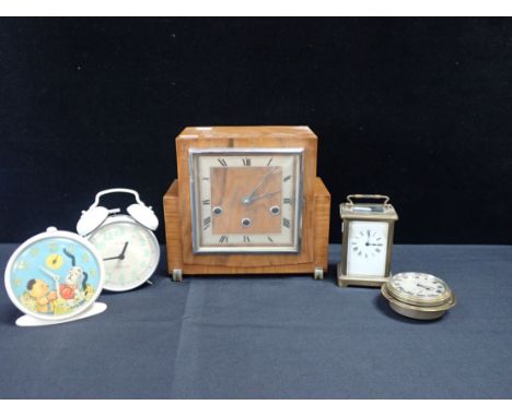 A VINTAGE BRASS CAR CLOCK, BEZEL WINDING retailed by Clement White, Yeovil (running), with a brass carriage clock (a/f), a Sm