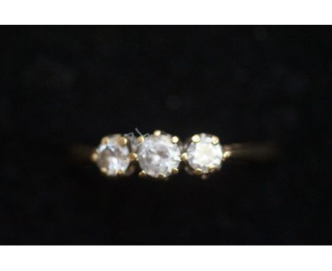 9ct Gold dress ring set with 3 white stones 