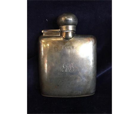 A Silver hip flask hallmarked Birmingham and engraved GB 11cm tall 120g 