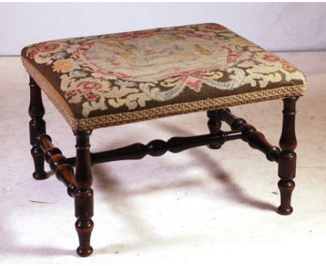 tapestry top, turned and carved legs with turned and carved stretcher