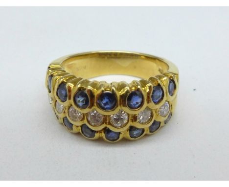 An 18ct gold, sapphire and diamond ring, 8.2g, M