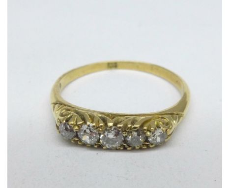 An 18ct gold and five stone diamond ring, 2.7g, S