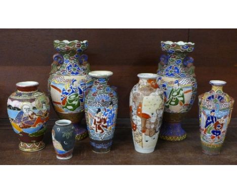 Seven Japanese vases, with applied enamel decoration