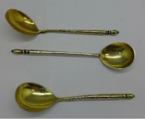 Three Russian silver gilt and enamel spoons/ladles