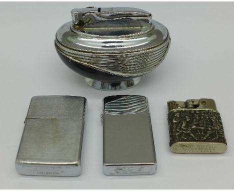 A silver mounted lighter with Dutch marks and three other lighters