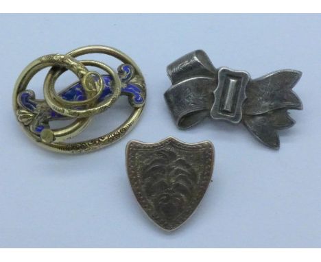 Three Victorian brooches including one silver hallmarked Birmingham 1876, by Burrows and Mills, one with enamel a/f