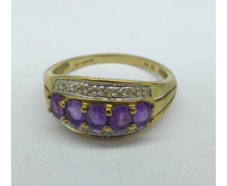 A 9ct gold, amethyst and diamond ring, 2.4g, R