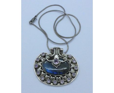 A silver, labradorite and amethyst pendant and chain