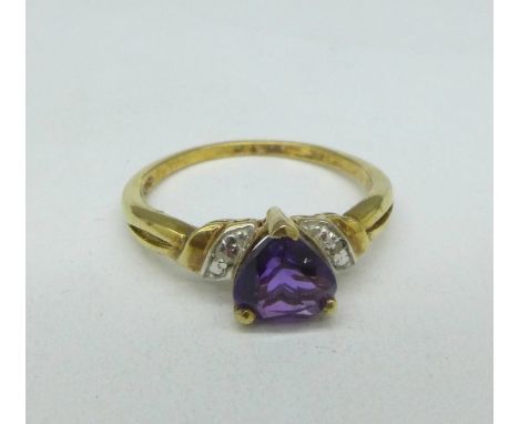 A silver gilt, amethyst and diamond ring, O