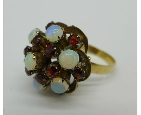 A 9ct gold, opal and garnet cluster ring, 5.6g, Q