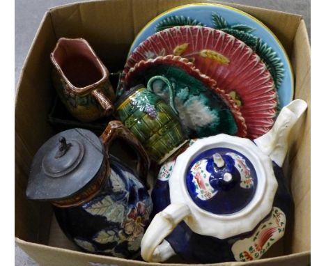 Three majolica plates, three jugs, a planter and a gaudy Welsh teapot, lid a/f