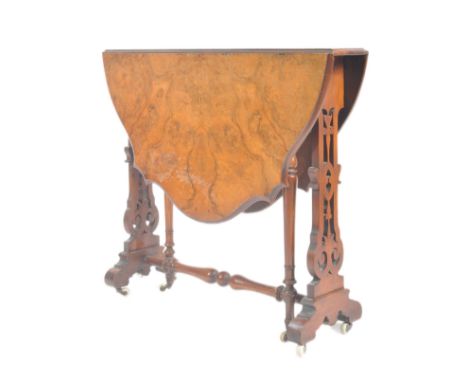 A 19th century Victorian walnut Sutherland drop leaf table. The table having a veneered top with twin drop leaves to side. Ra