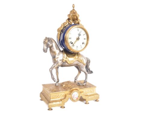 A 20th century Italian gilt-metal ormolu mounted equestrian Imperial mantel clock. The cobalt blue ground enamelled barrel sh