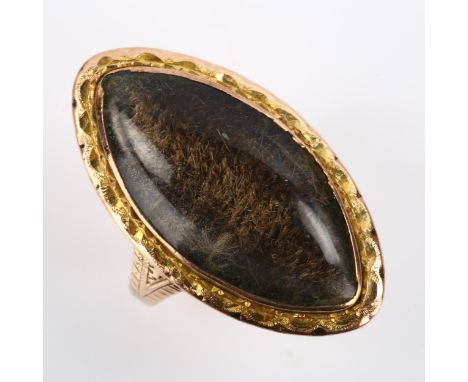 A Georgian marquise mourning ring, unmarked gold closed-back settings, with central hair panel under convex glass with bright