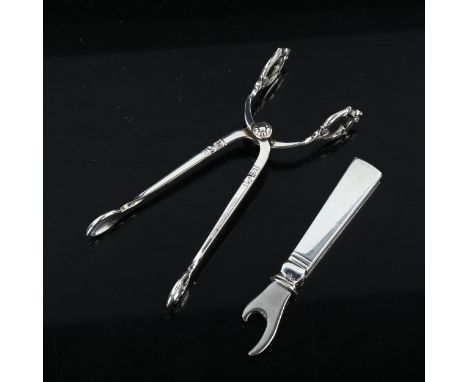 GEORG JENSEN - a Vintage Danish sterling silver-handled bottle opener, length 8cm, and a pair of sterling sugar tongs by Cohr