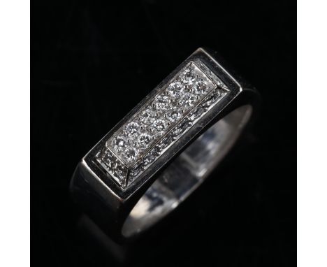 GARRARD - a late 20th century 18ct white gold diamond dress ring, with pave set modern round brilliant-cut diamond raised pan