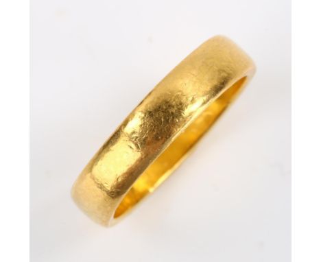 A late 20th century 22ct gold wedding band ring, maker's marks JJ, hallmarks London 1978, band width 4.5mm, size M, 6.4gNo da