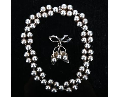 2 pieces of Vintage Danish stylised silver jewellery, comprising necklace and brooch, makers include John Lauritzen, necklace