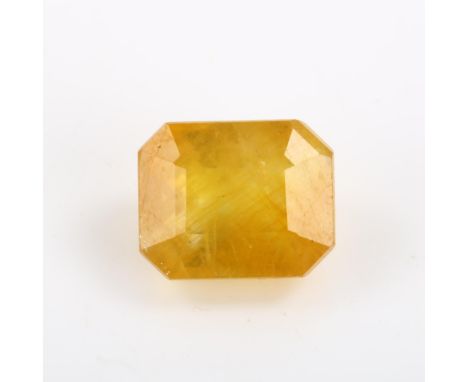 An unmounted 7.63ct octagonal step-cut yellow sapphire, 10.81mm x 8.72mm x 6.78mm, with ITLGR report cardLot sold as seen unl