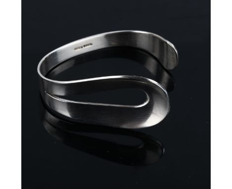 HORSENS SOLVVAREFABRIK - a Danish sterling silver modernist asymmetric cuff bangle, band width 29.4mm, internal measurements 