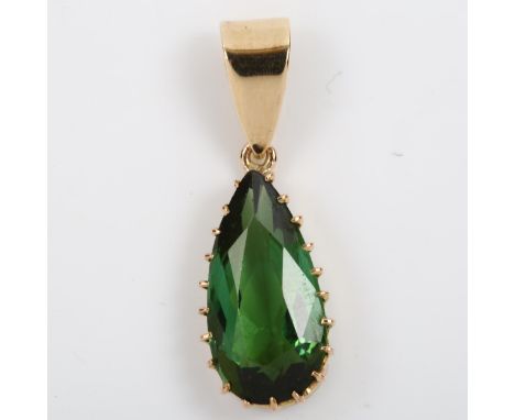 A modern green tourmaline pendant, unmarked gold settings with pear-cut tourmaline, pendant height 24.9mm, 1.4gNo damage or r
