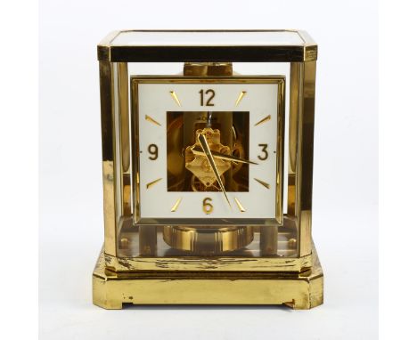 JAEGER LECOULTRE - a lacquered brass Atmos clock, square white dial with Arabic numerals and glass panelled case, serial no. 