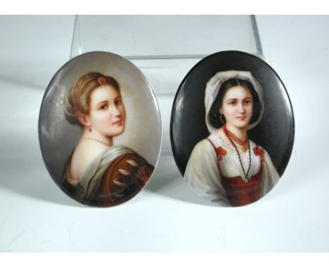 Two 19th century porcelain oval portrait plaques, one painted with a noblewoman with jewelled headdress and pearl necklace, t