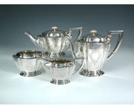 An American four piece silver tea service, the hot water jug, cream jug and sucrier by Mermod Jaccard & King, St Louis, Misso