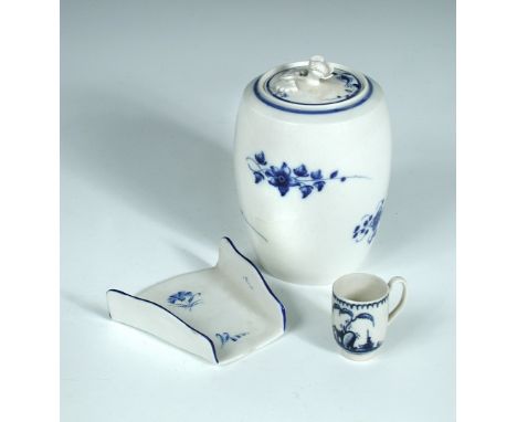 A Caughley blue and white tea caddy and cover, circa 1775, the barrel shaped body painted with floral sprays, the flat cover 