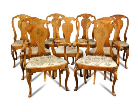 A set of twenty four George II style walnut dining chairs - 20th century, with scroll crest rails and vase splat backs, tapes