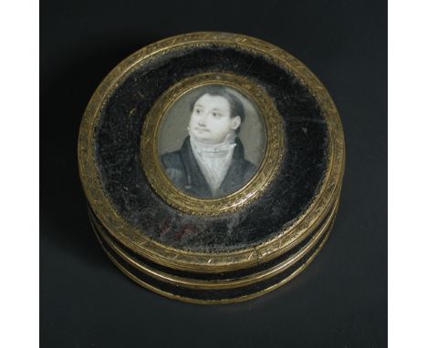 A French tortoiseshell and gilt metal mounted circular snuff box and cover, circa 1800, the top inset with an oval portrait m