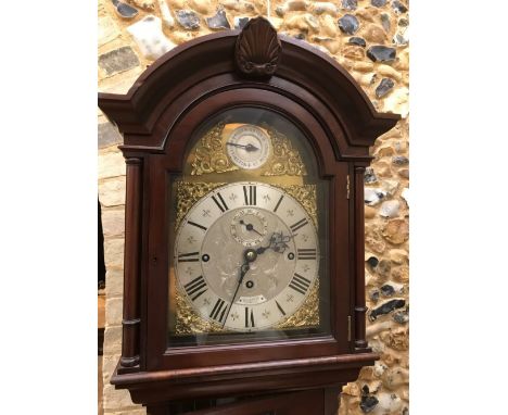 An Edwardian mahogany tubular chiming longcase clock, signed 'Collingwood, 46 Conduit St., W1', the breakarch hood with 10.5i