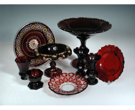 A collection of Bohemian ruby glass, to include a pedestal bowl, a comport with detachable base, pair of small vases, two sma