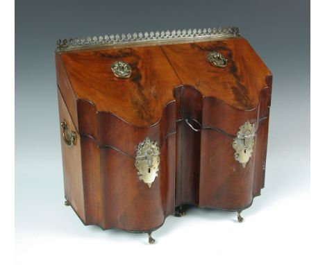 A pair of conjoined George III mahogany knife boxes, now as a decanter box, the three-quarter galleried top opening to reveal
