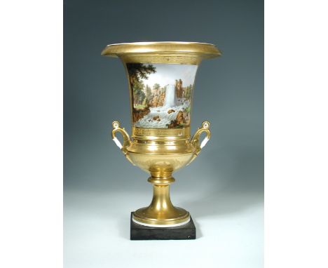 A Paris porcelain two handled vase, the urnular body richly gilt and tooled with cherubs and foliage, reserved with a square 