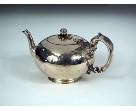 A Victorian silver bullet shaped teapot, by The Barnards, London 1857, engraved with the crest of the Fenwick family, with sc