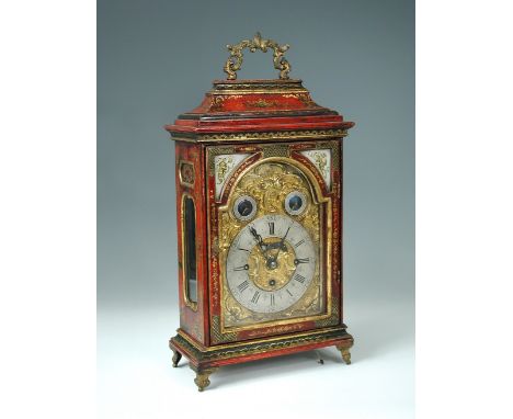 An 18th century German or Austrian red chinoiserie three train bracket clock, the carrying handle above 17cm gilt dial with t