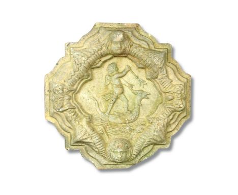 Three yellow clay architectural wall Boss, each depicting Amorini riding serpents (3) 24cm (9in)  