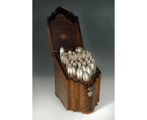 A George III composed canteen of cutlery for twelve, comprising table forks, dessert forks, table spoons, dessert spoons, tea