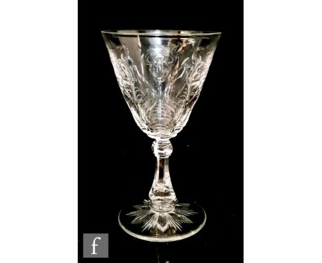 A late 19th Century Stevens &amp; Williams rock crystal style drinking glass, the round funnel bowl decorated with a repeated